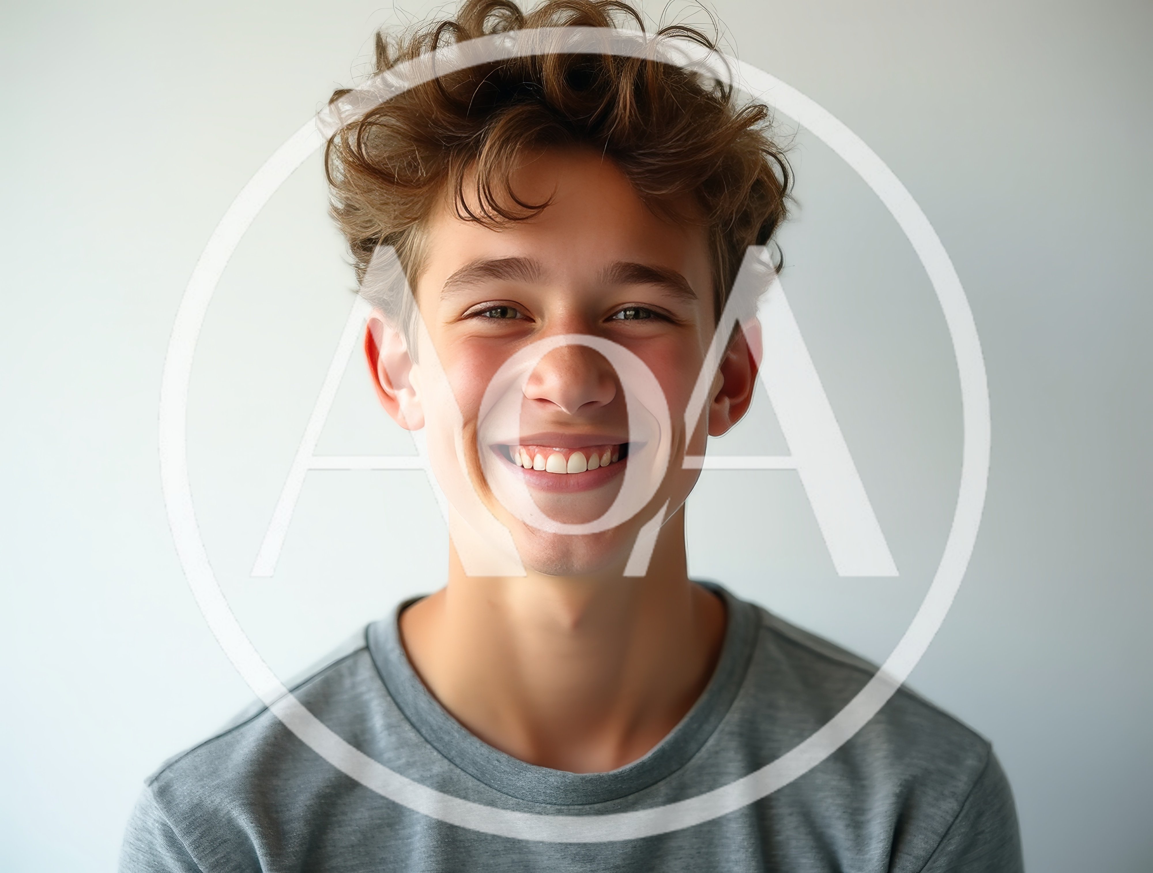 Portrait Of A Smiling Teenage Boy