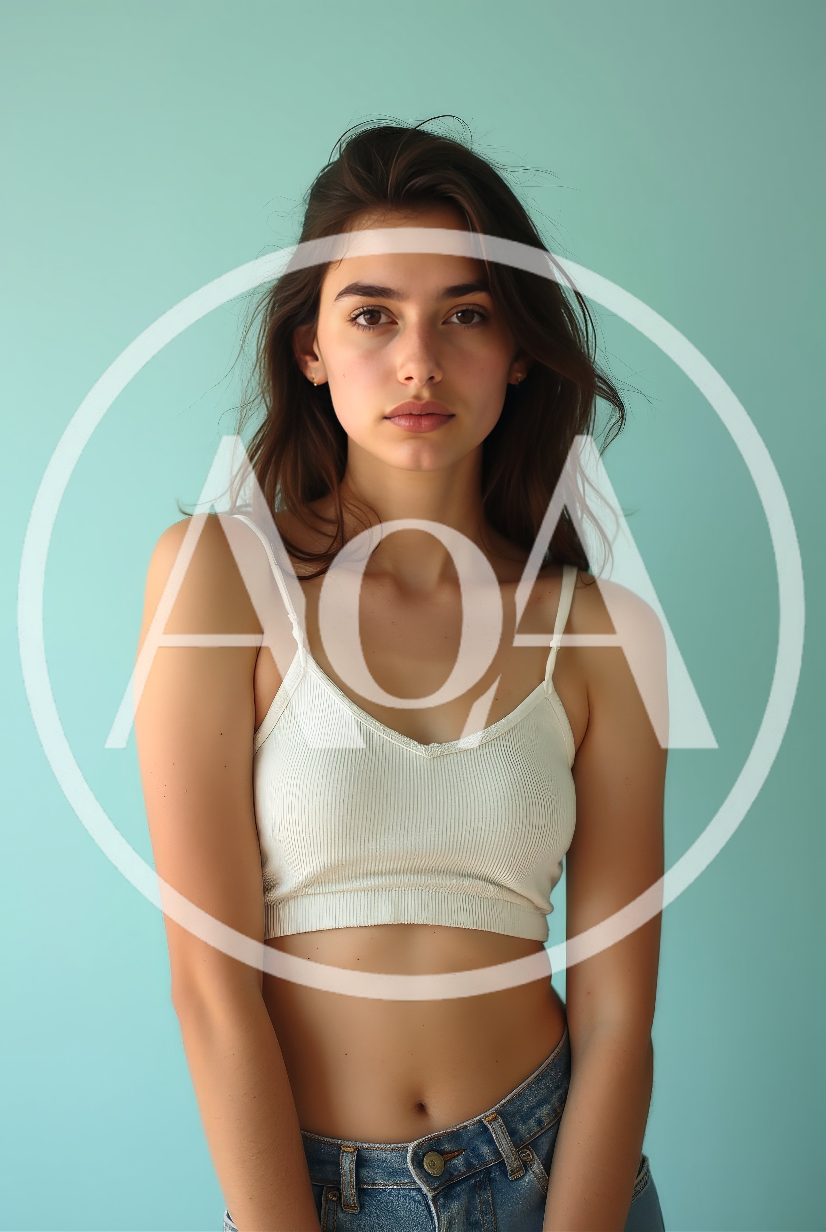 Teenage girl expressing disgust in studio setting