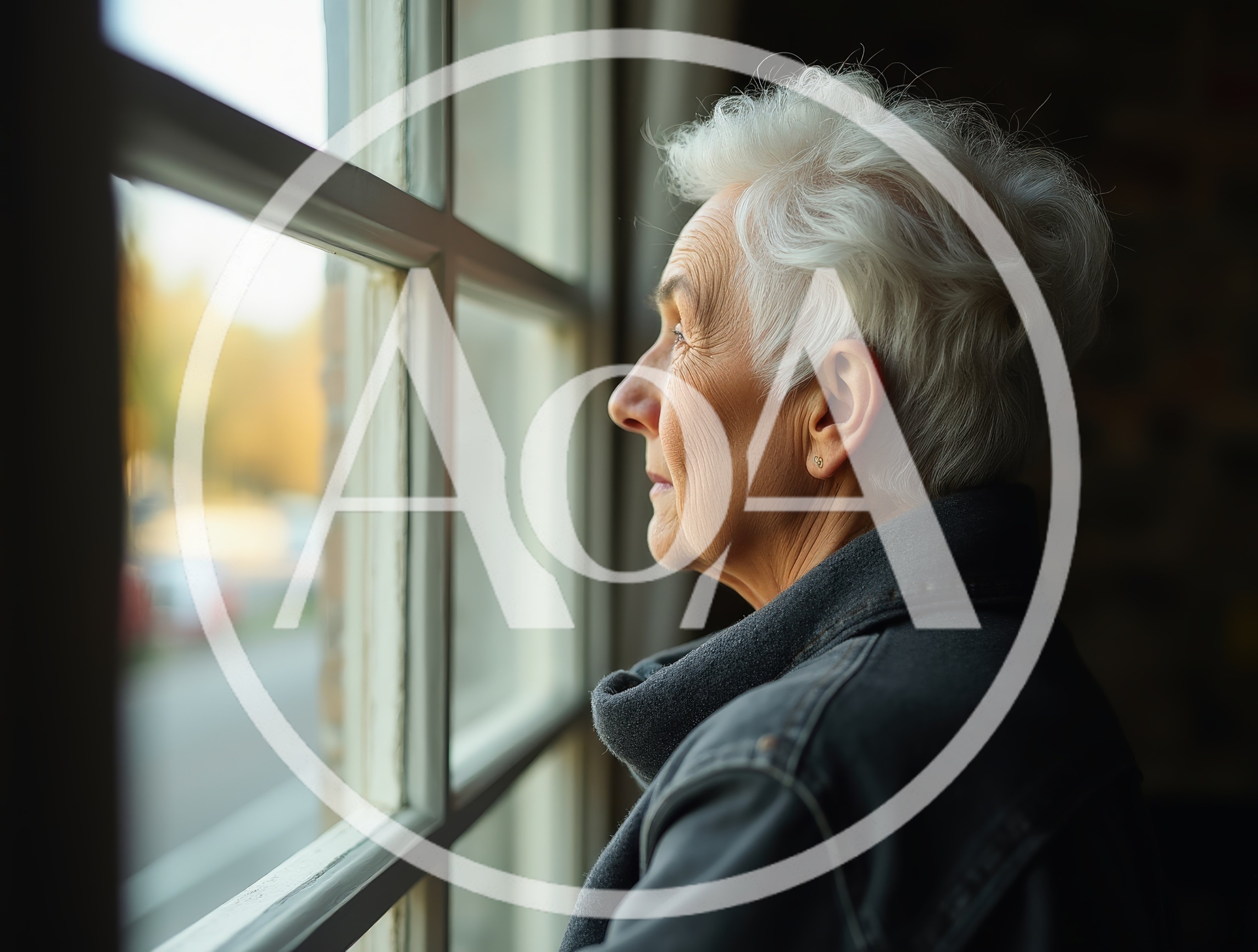 Elderly Woman Looking Out Of A Window