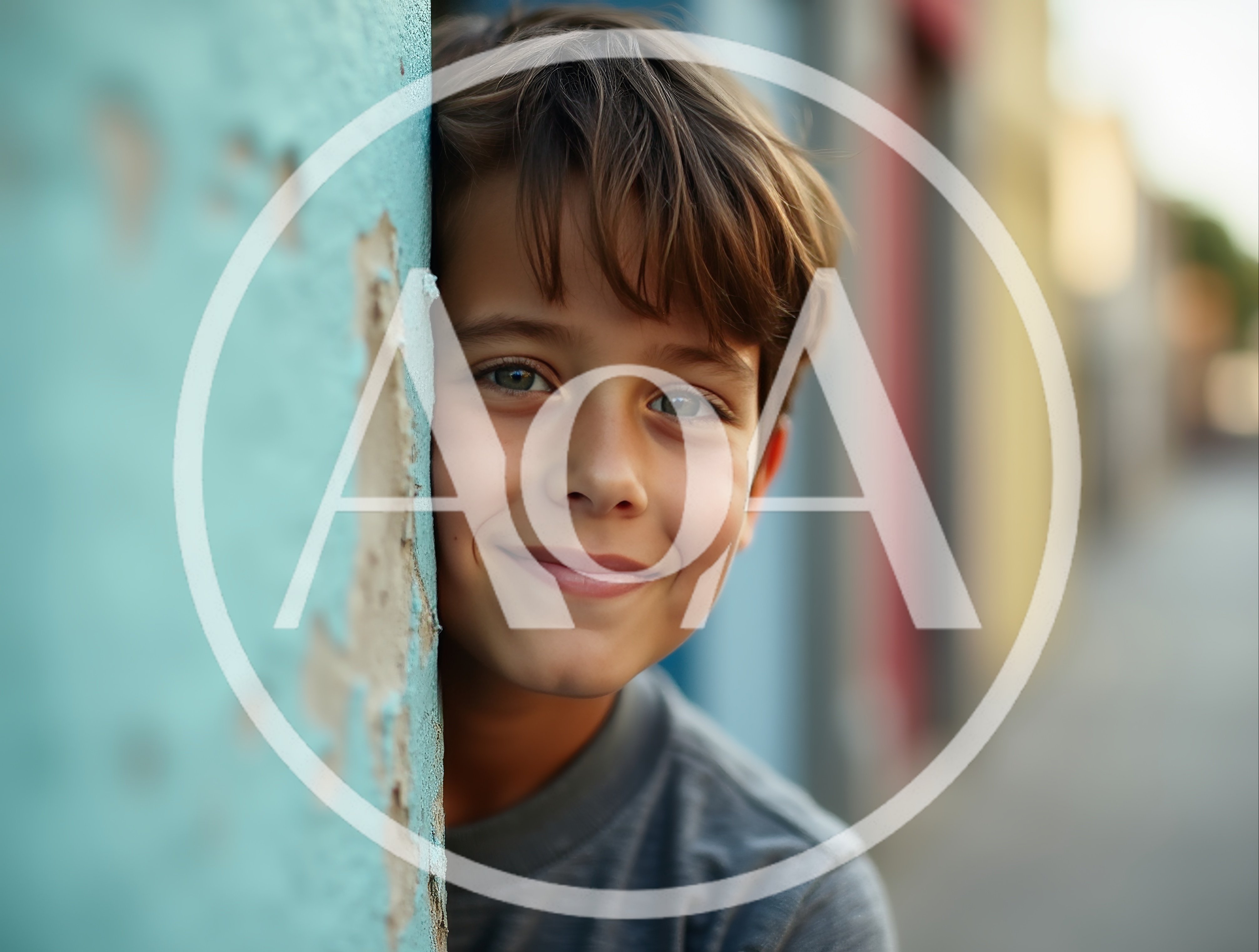 Young Boy Peeking From Behind A Blue Wall