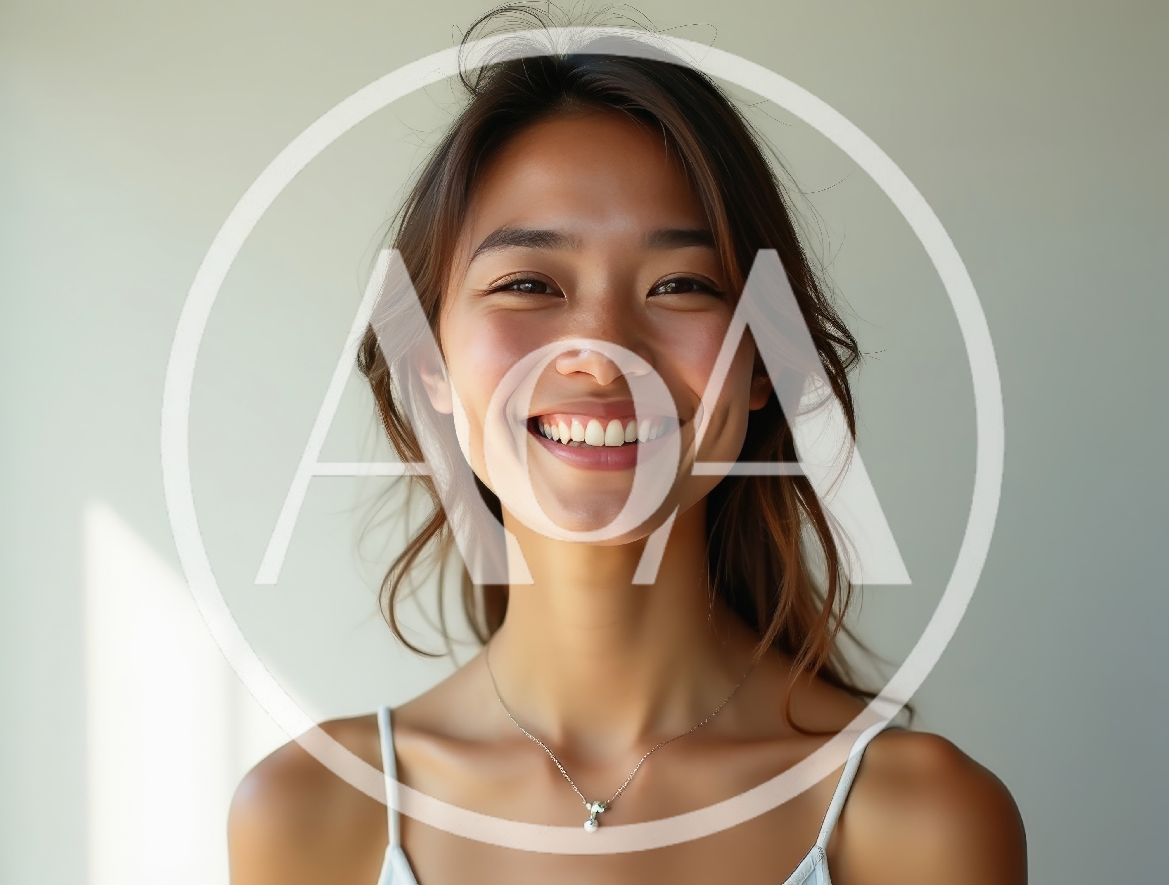 Portrait Of A Smiling Young Asian Woman