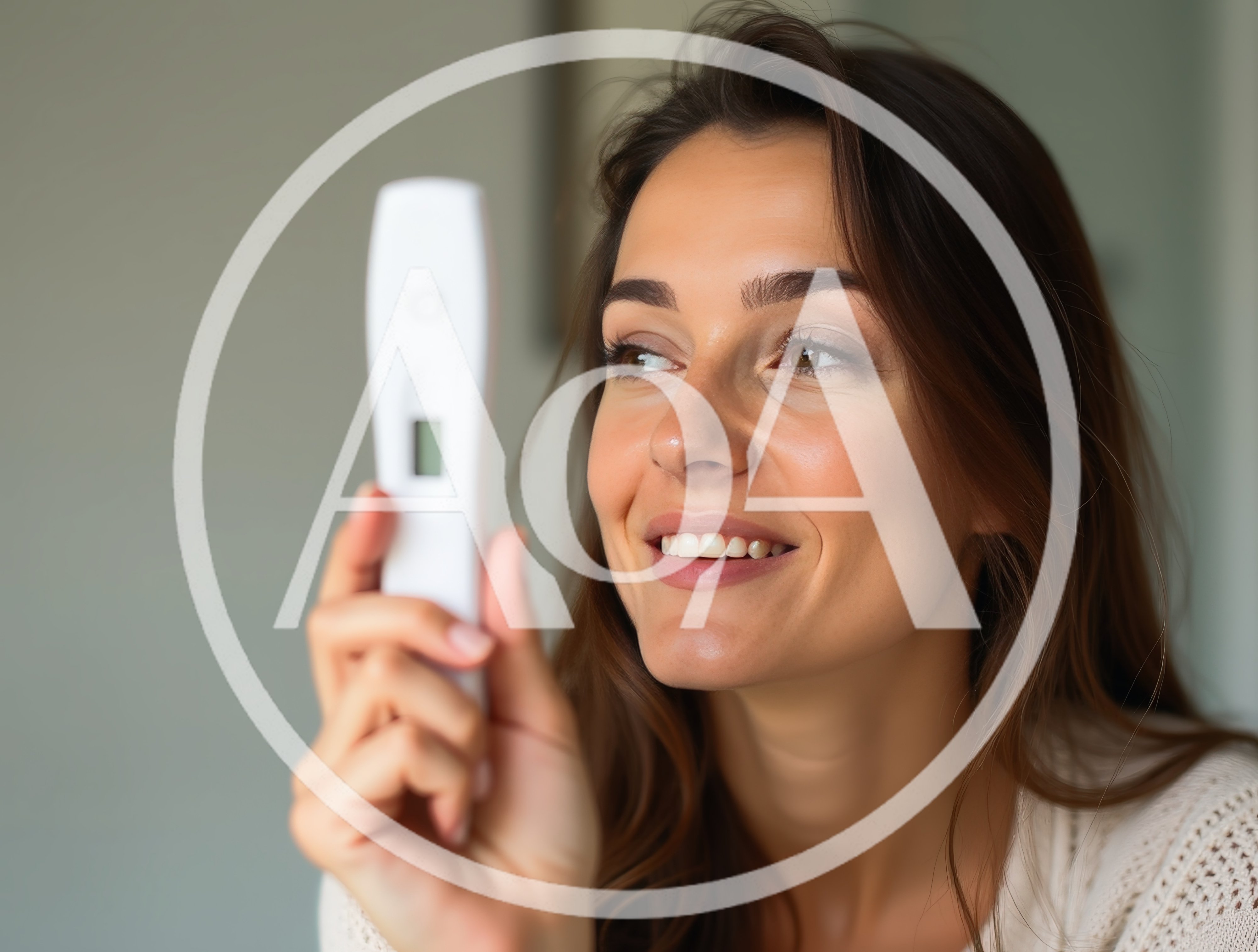 Happy Woman Holding A Digital Pregnancy Test