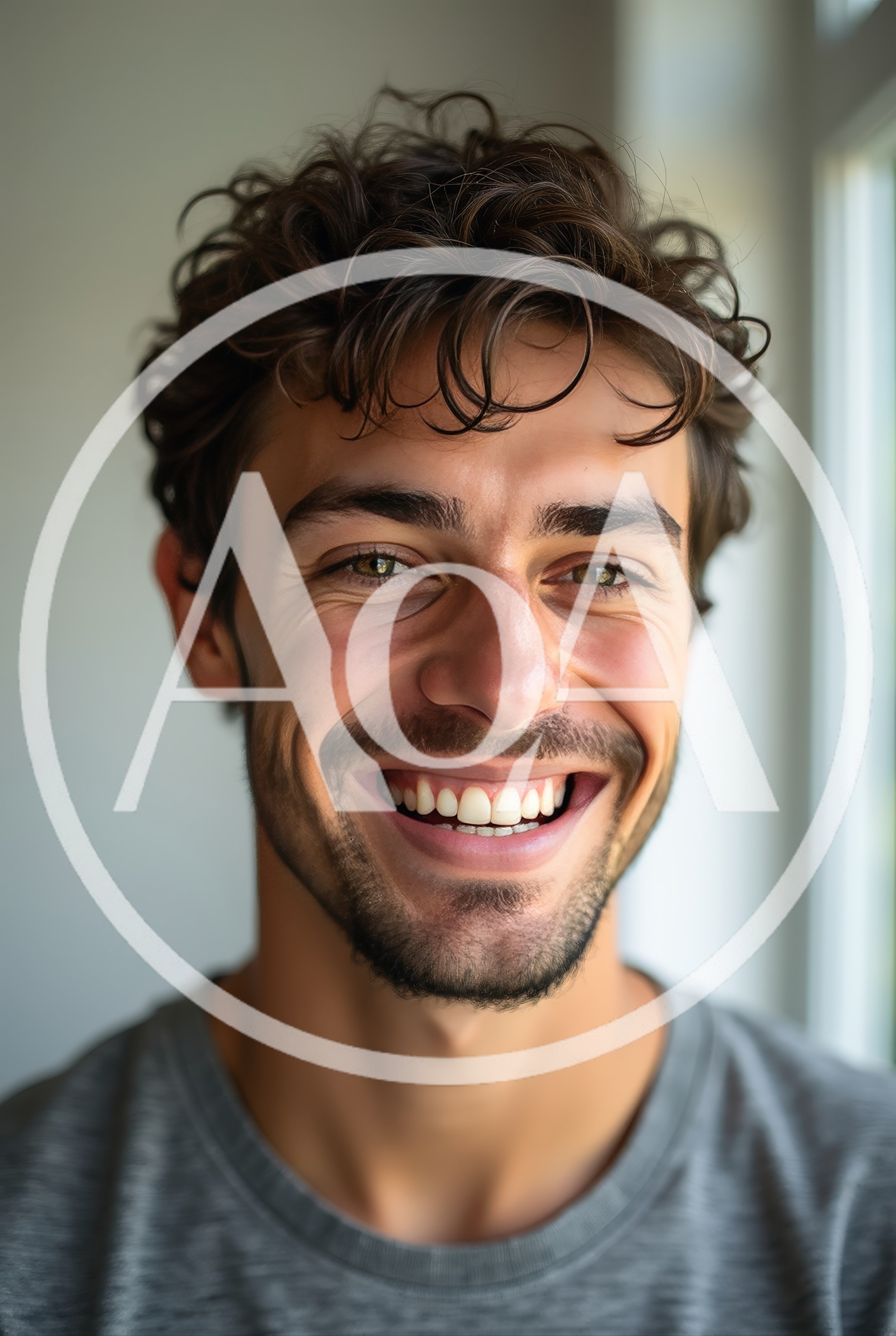 Portrait Of A Smiling Young Man With Curly Hair