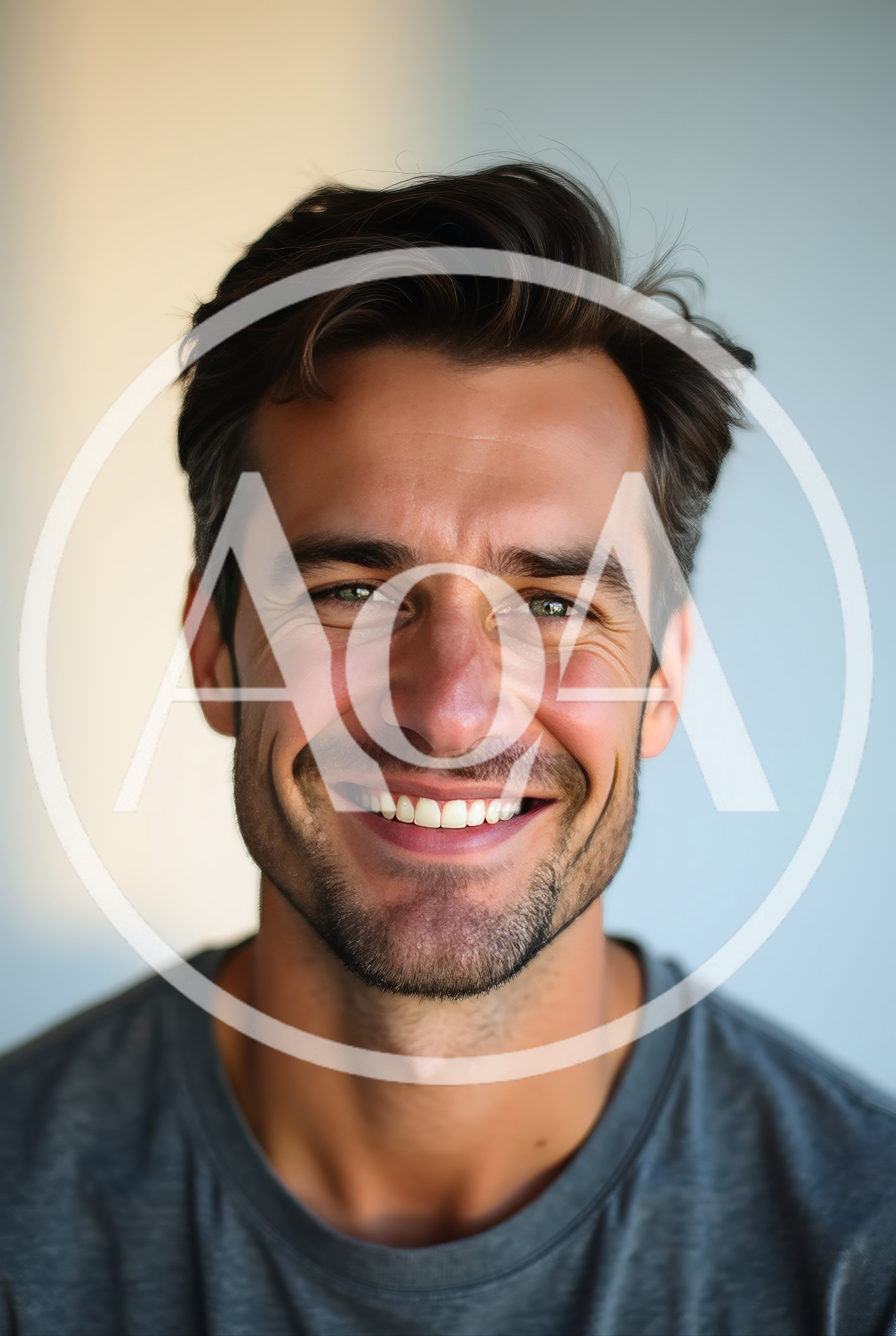 Portrait Of A Smiling Man With Stubble