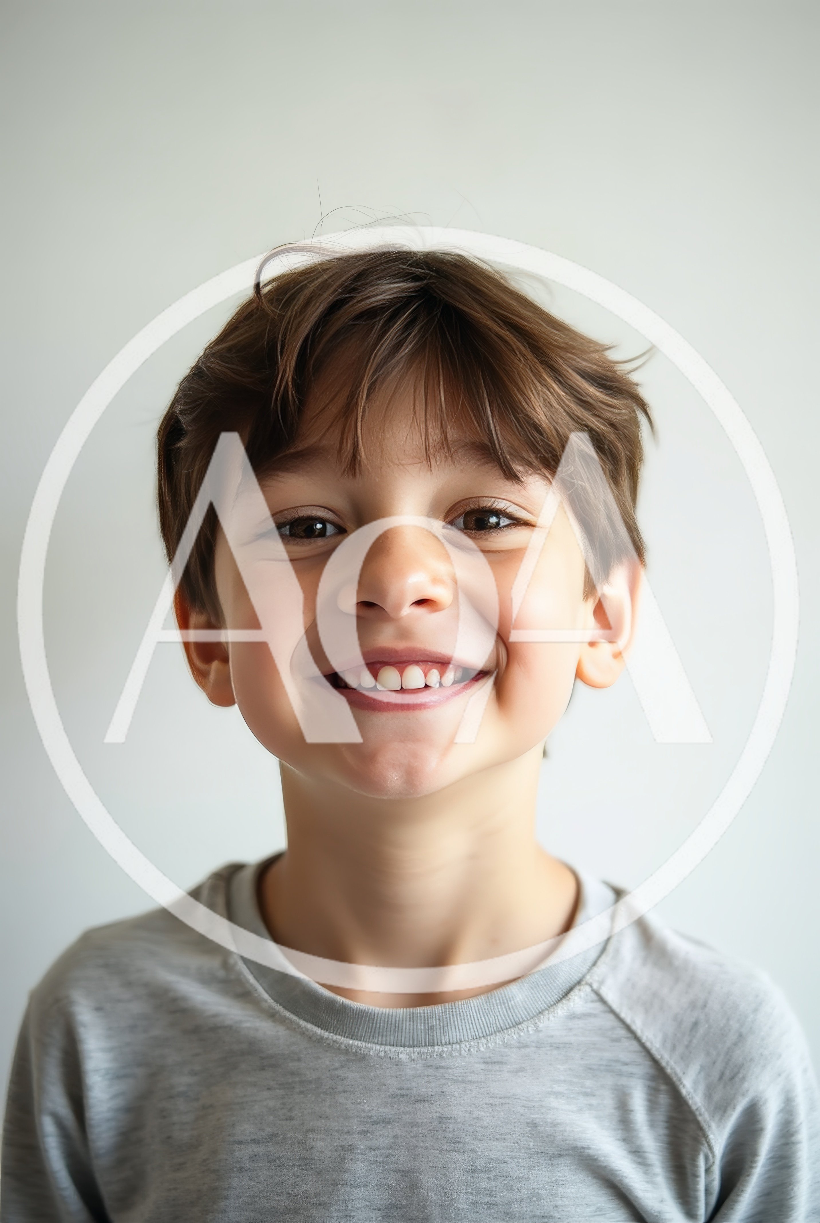Portrait Of A Smiling Young Boy