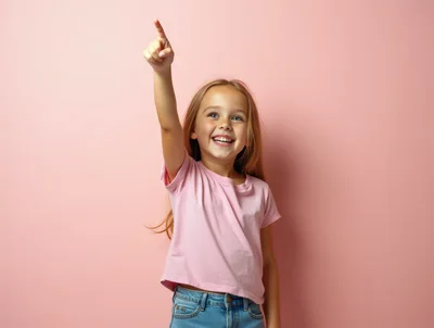 Happy Little Girl Pointing Upwards