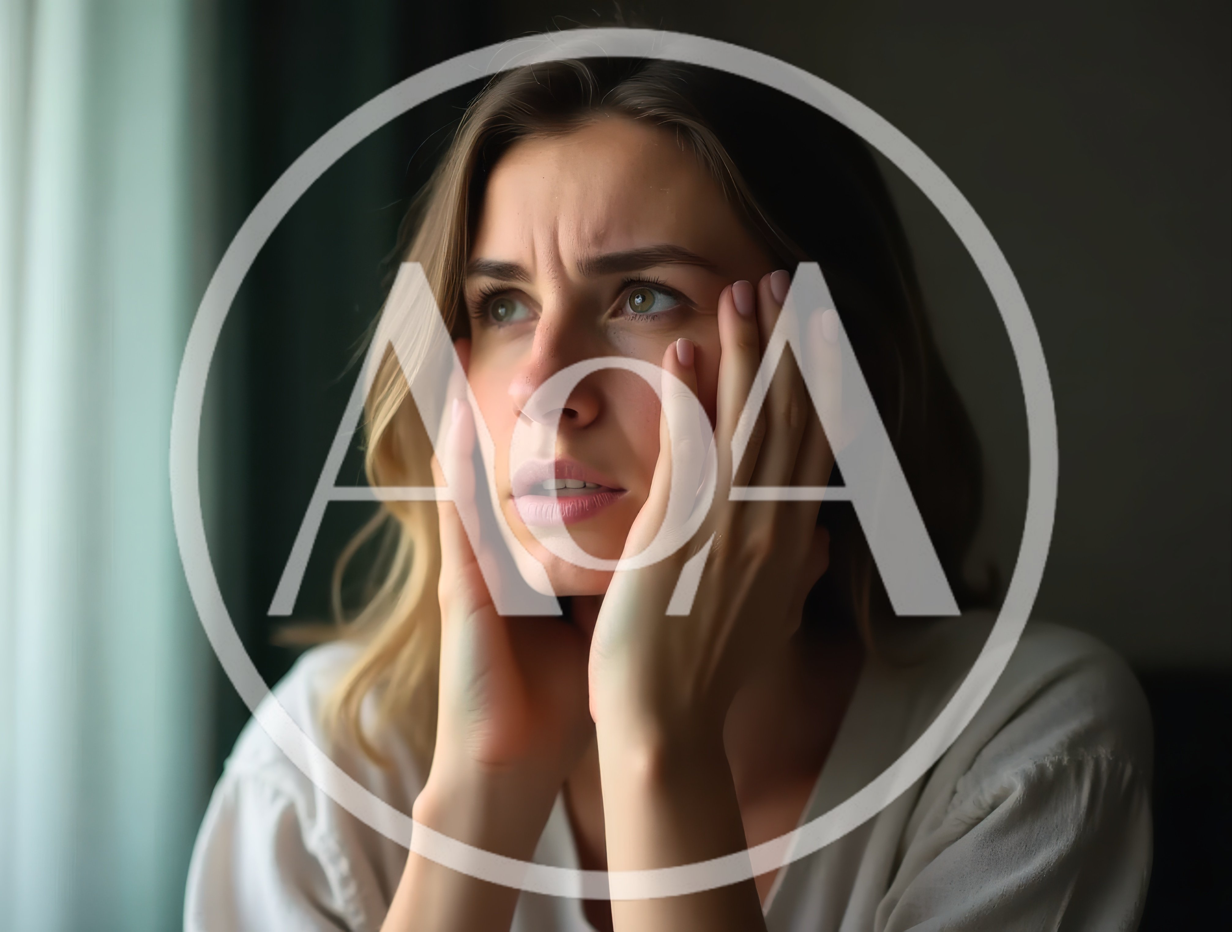 Stressed Young Woman Holding Her Face In Concern