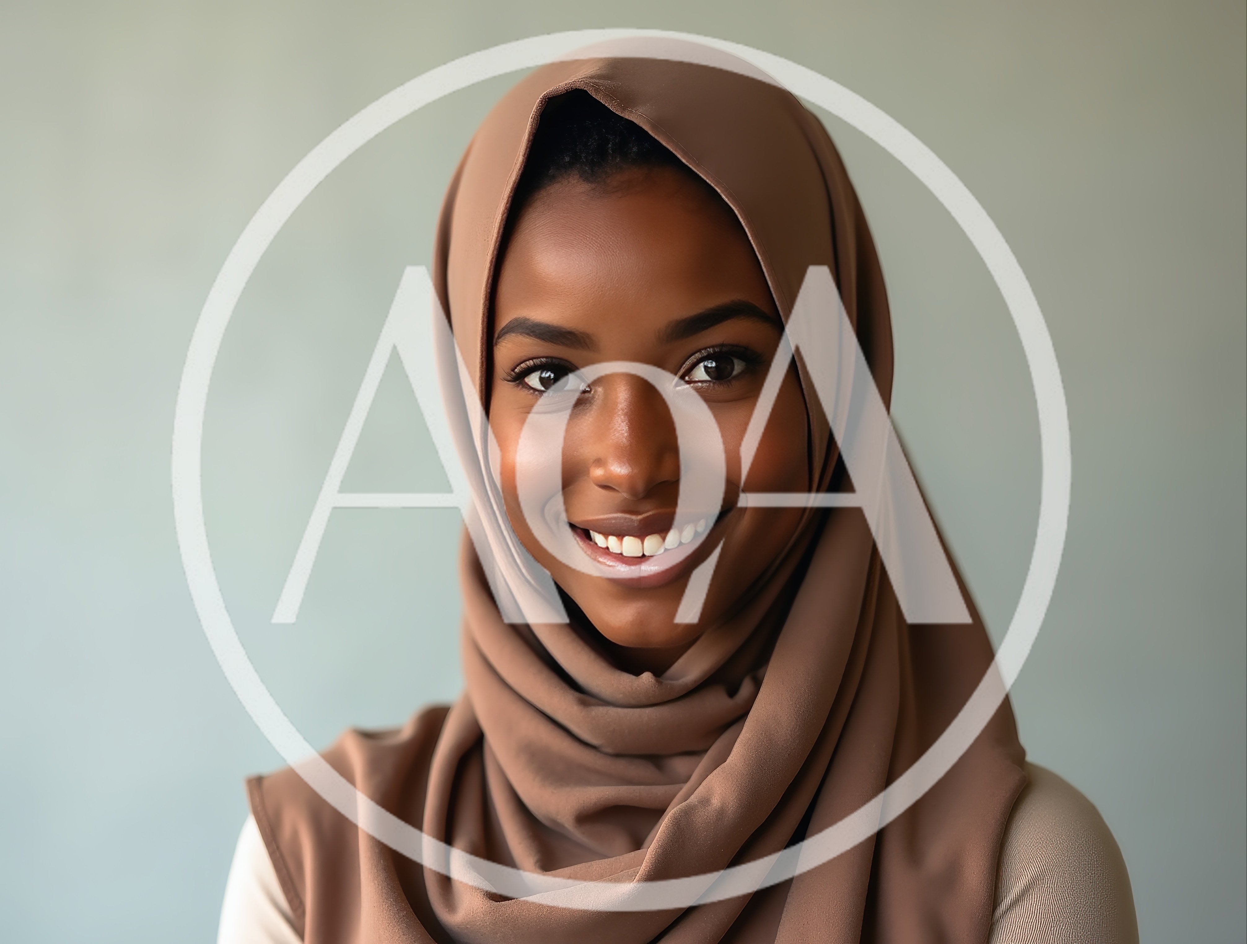 Portrait Of A Smiling Young Woman Wearing A Hijab