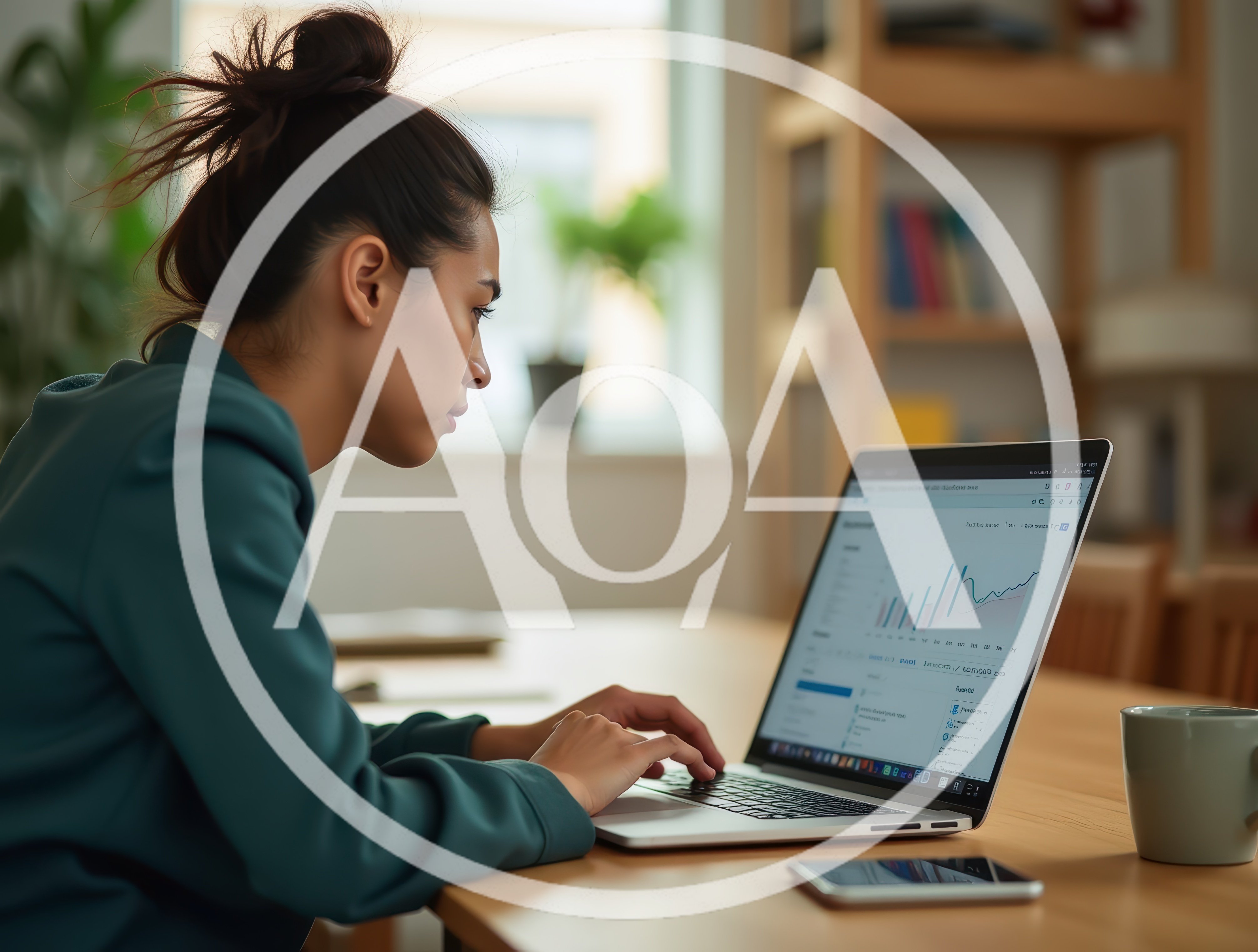 Young Woman Working On Laptop At Home Office