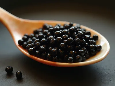 Black Caviar Served On A Mother Of Pearl Spoon
