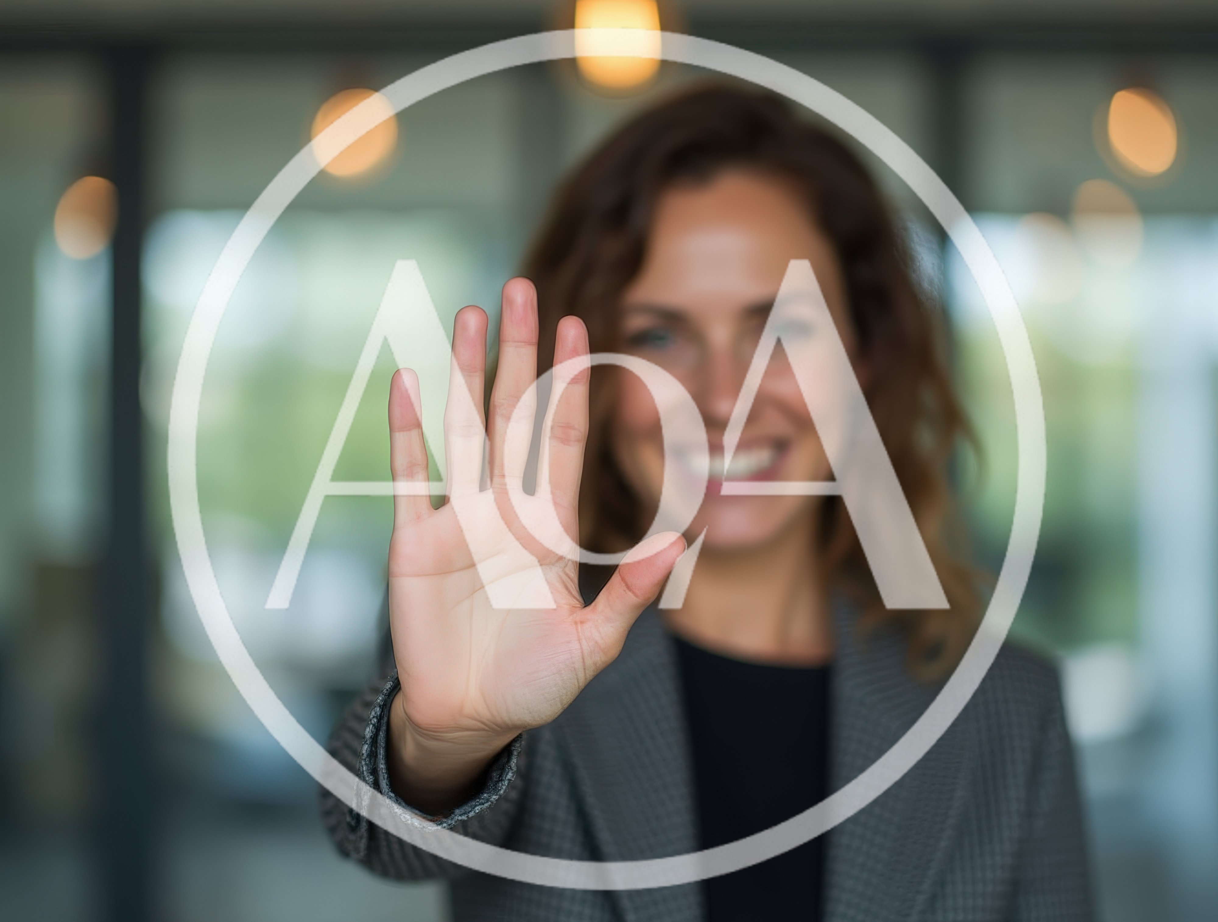 Businesswoman Holding Up Hand In Stop Gesture