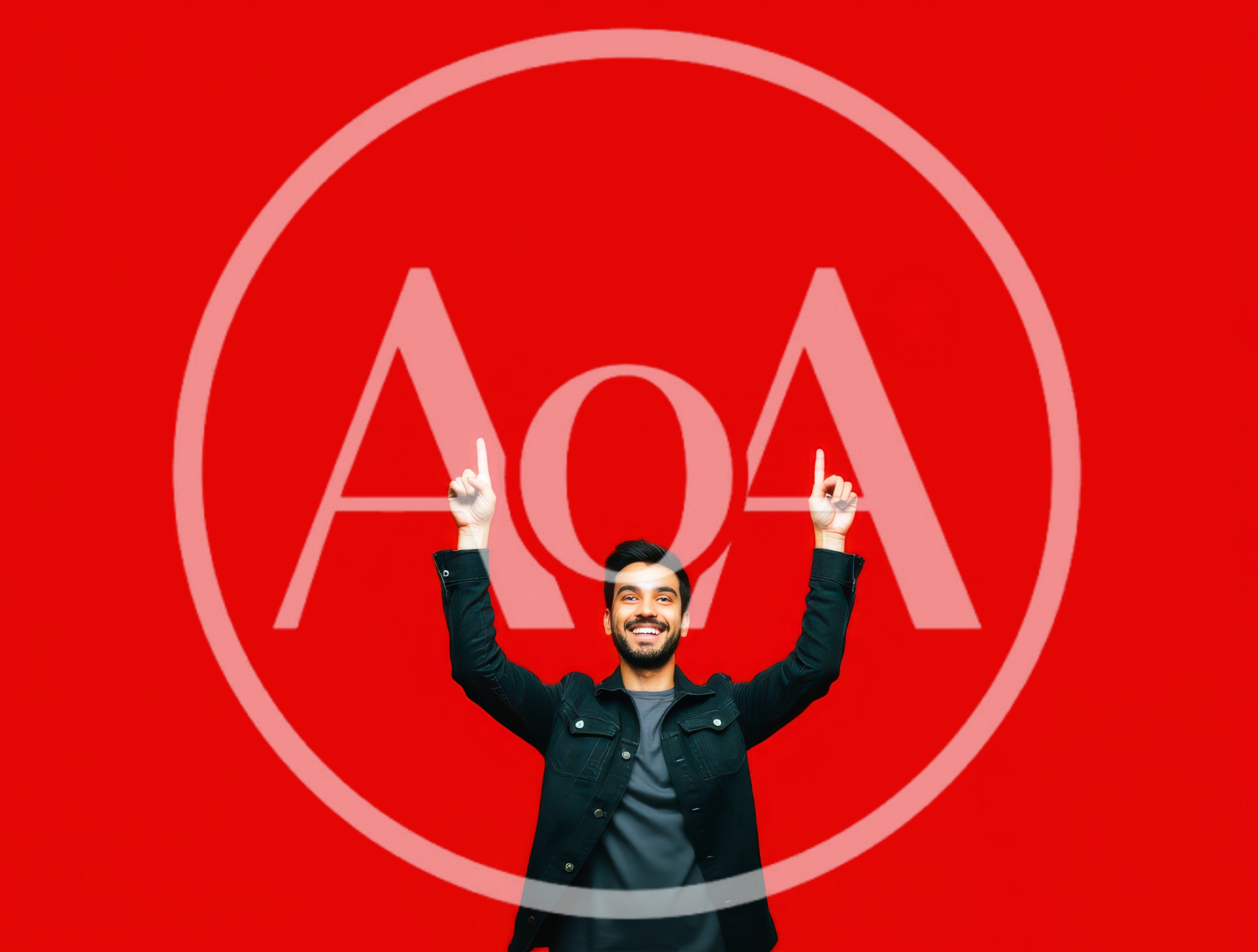 Happy Man Pointing Upwards Against Red Background