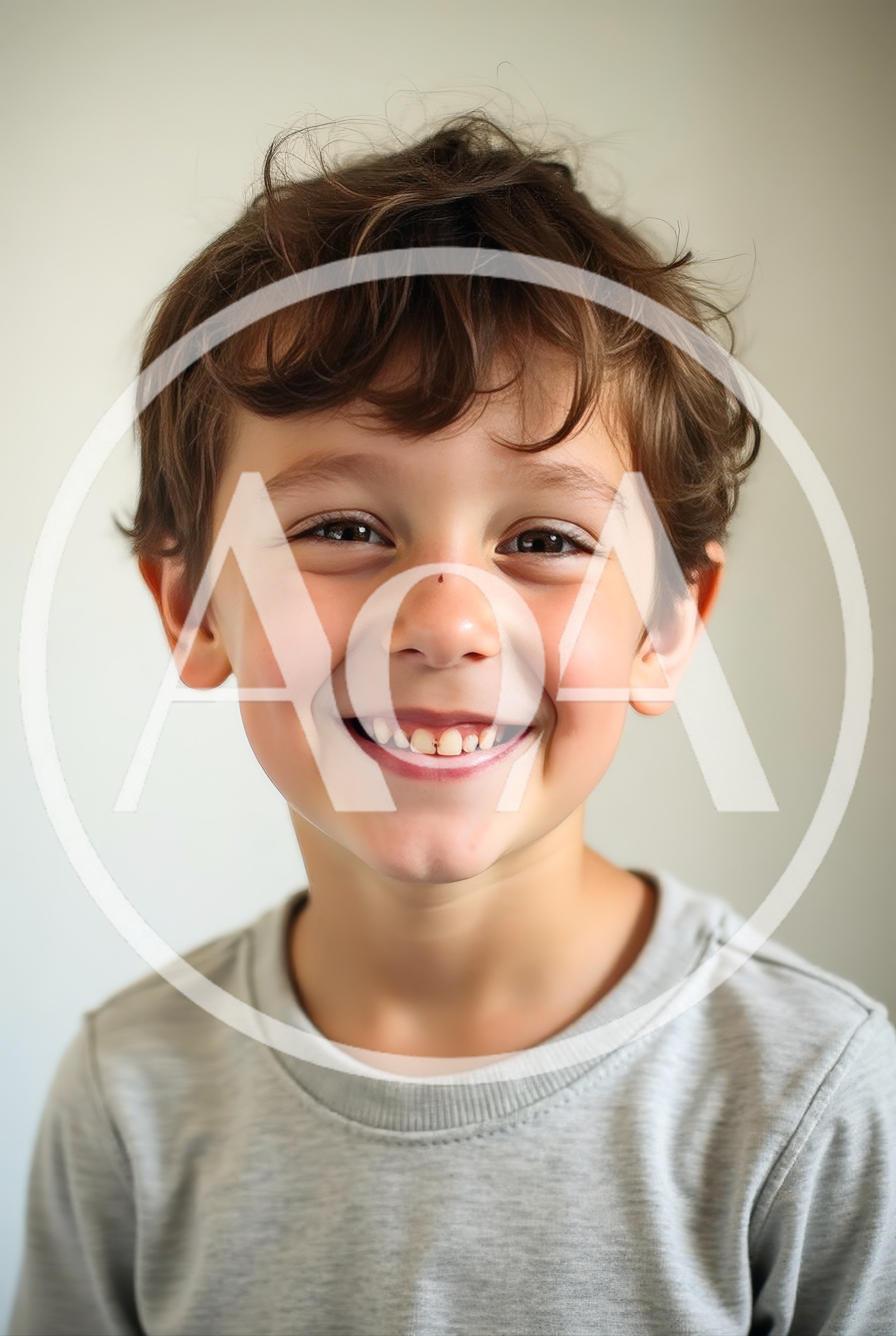 Portrait Of A Smiling Young Boy