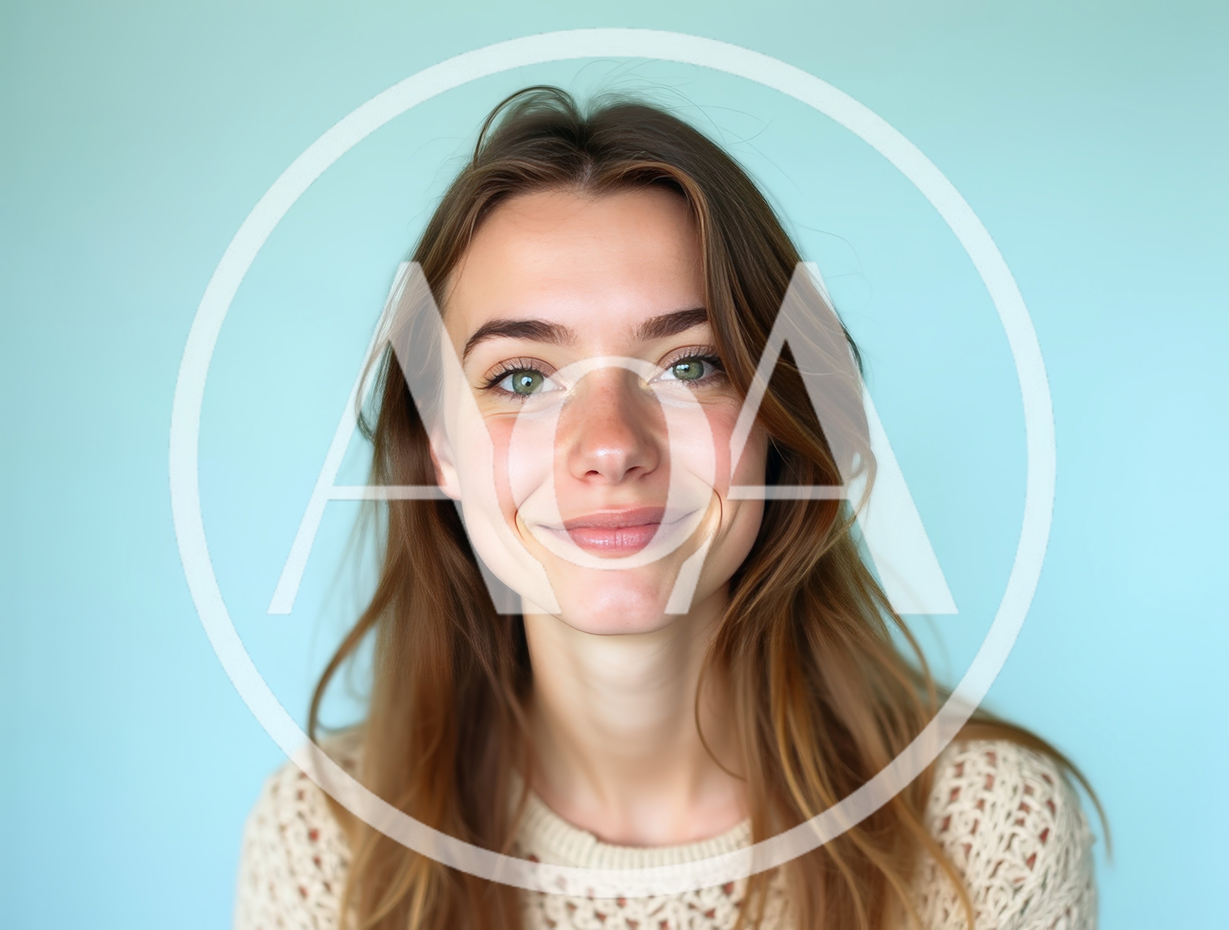 Portrait Of A Young Woman Smiling Against Blue Background