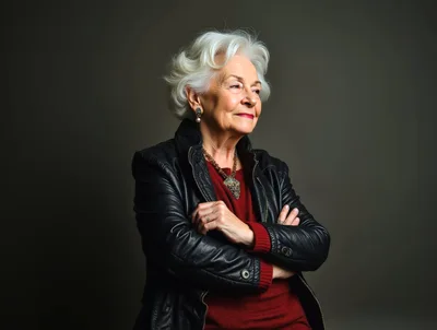 Elegant Senior Woman Posing In Leather Jacket