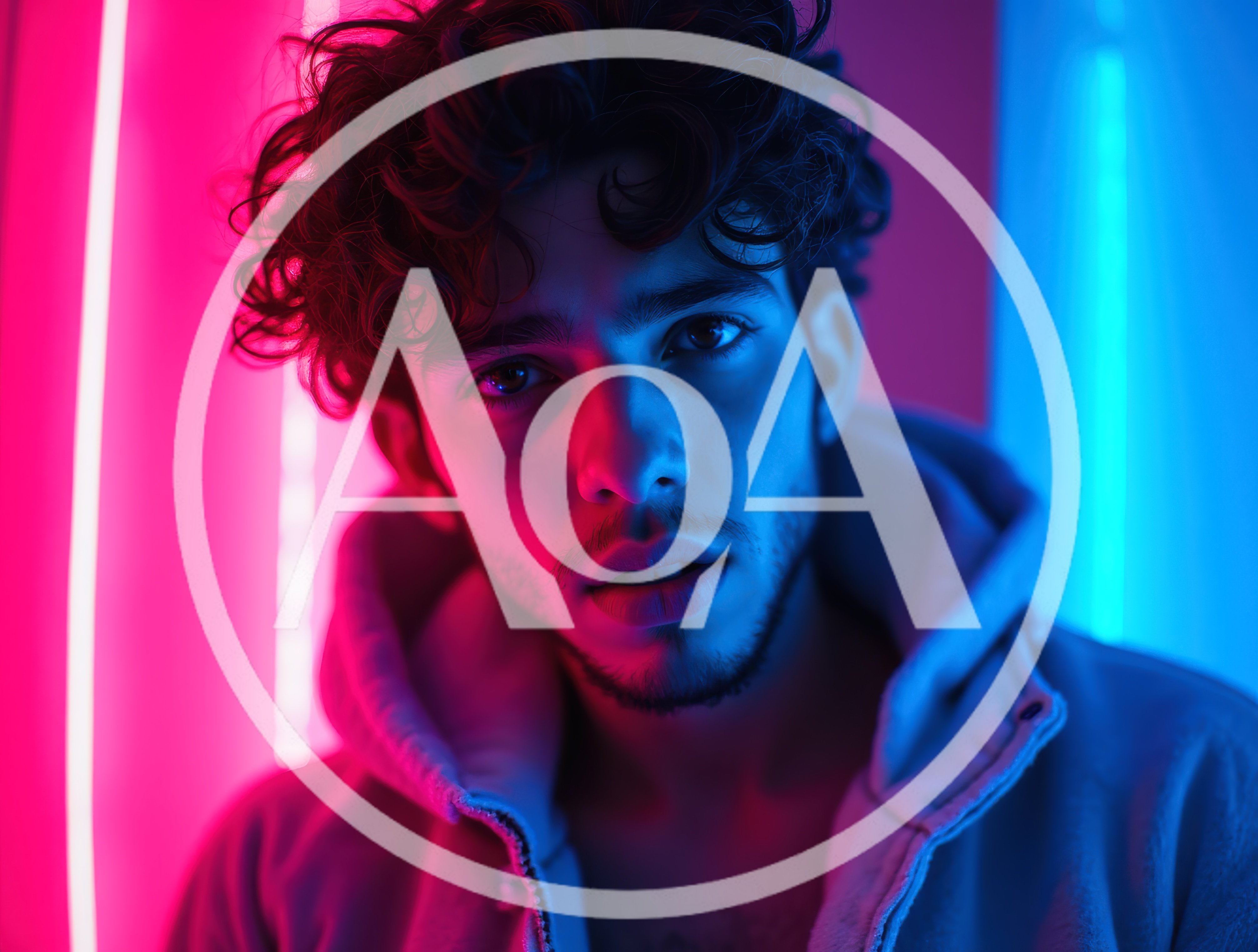 Young Man With Curly Hair Under Neon Lighting