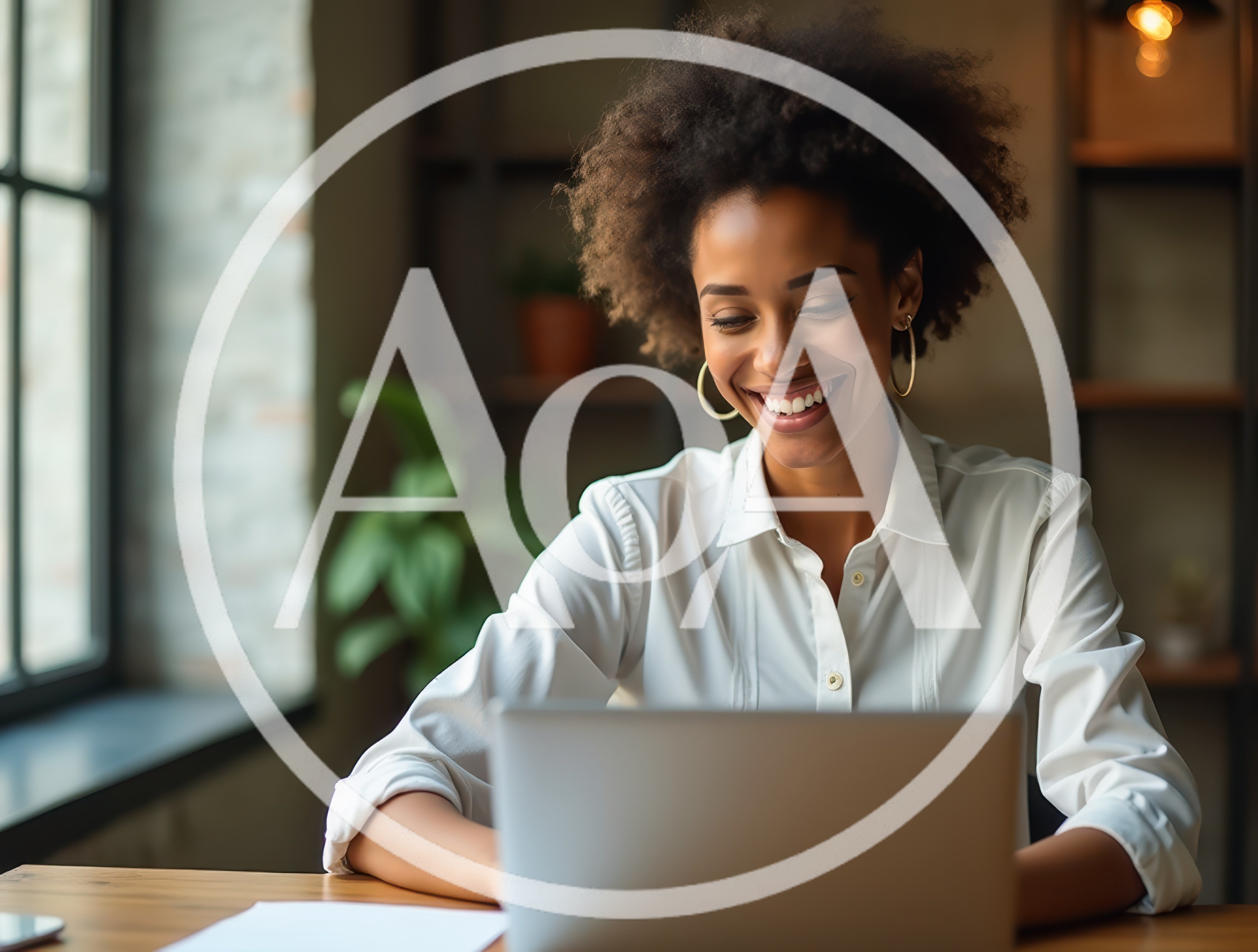Smiling Professional Woman Working On Laptop In Office