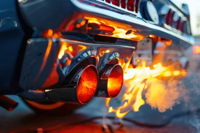 Classic Muscle Car Exhaust Pipes Spewing Fire
