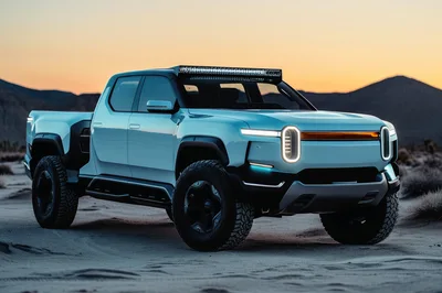 Modern Electric Pickup Truck In Desert Landscape