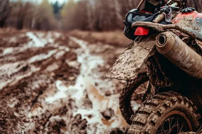 Muddy Dirt Bike Rear View On Off Road Trail
