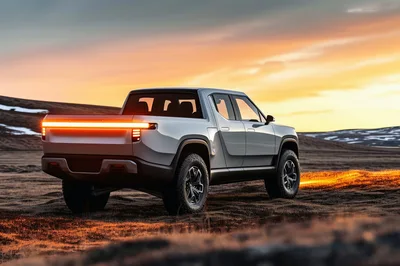 Modern Electric Pickup Truck Parked In Icelandic Landscape