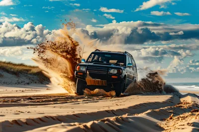 Off-Road SUV Driving Through Sand Dunes
