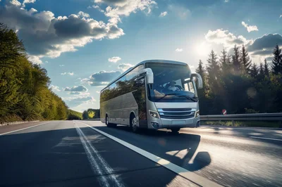 Modern Tour Bus Driving On A Scenic Highway