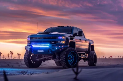 Custom Lifted Pickup Truck in Desert at Sunset