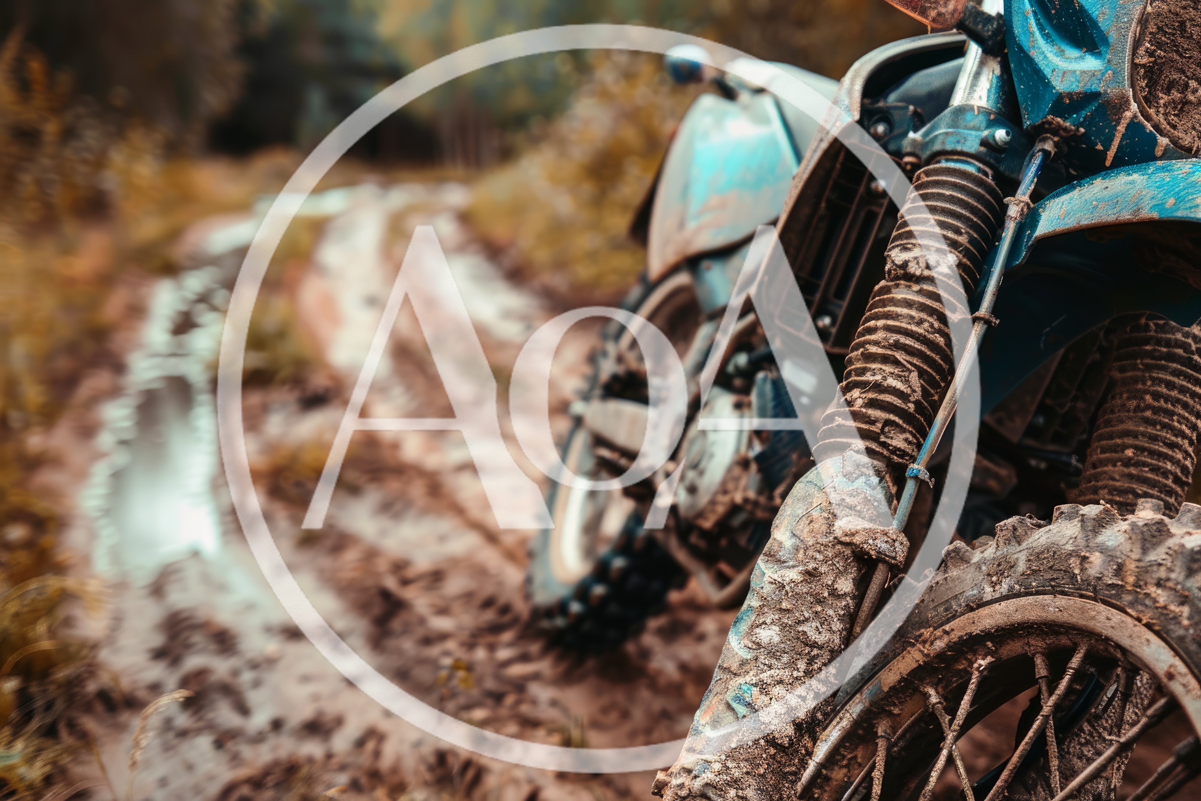 Muddy Dirt Bike Parked On A Forest Trail