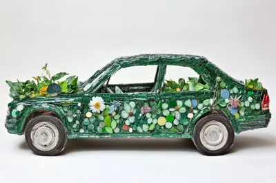 Green Mosaic Car Sculpture With Floral Decorations