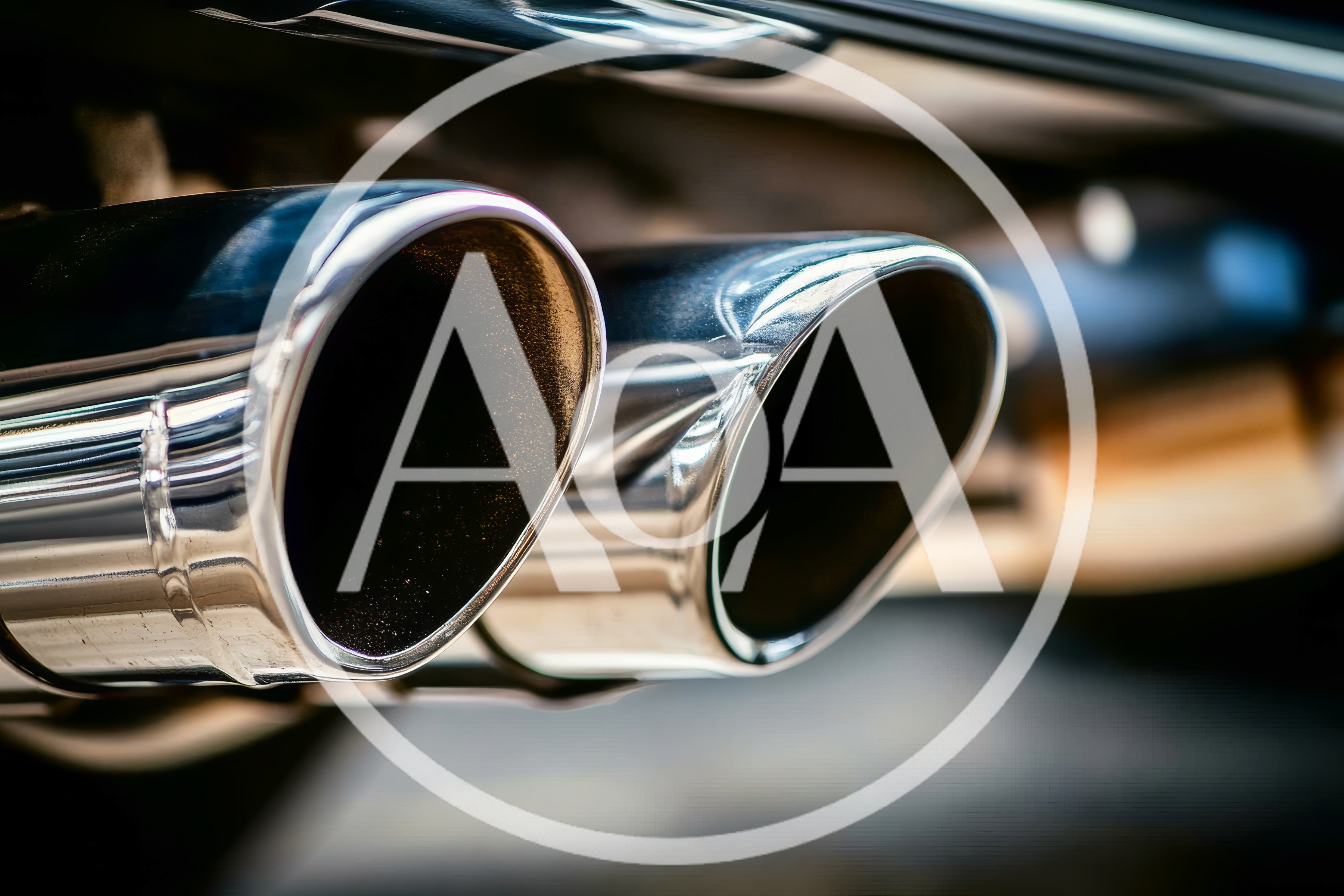 Close Up Of Shiny Chrome Car Exhaust Pipes