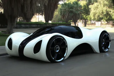 Futuristic White Concept Car Parked On A Sunny Street