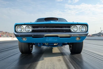 Blue Muscle Car Launching On Drag Strip
