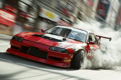 Red Drift Car Performing High Speed Burnout
