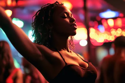 Young Woman Dancing At A Nightclub