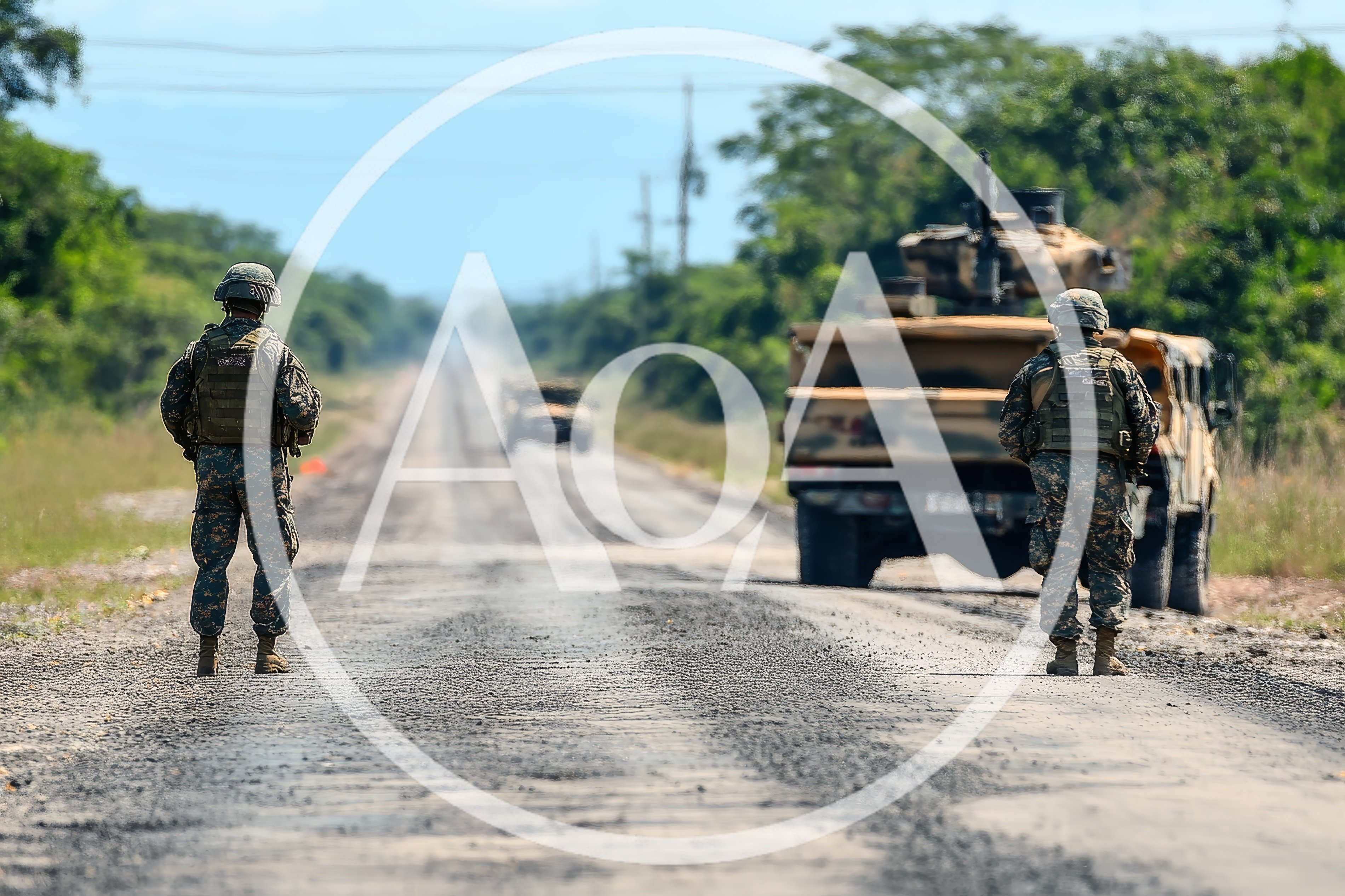 Military Soldiers Standing Guard on Rural Road
