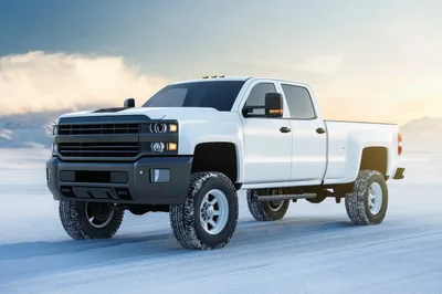 White Pickup Truck Parked On Snowy Landscape