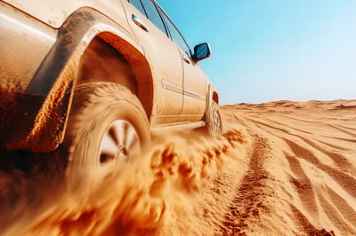 Off-Road SUV Driving Through Desert Sand Dunes
