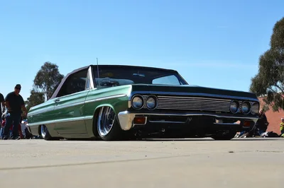 Custom Green Lowrider Convertible Car at Outdoor Show