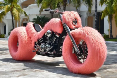 Custom Pink Furry Motorcycle Parked Outdoors