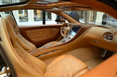 Luxury Car Interior With Tan Leather And Wood Trim