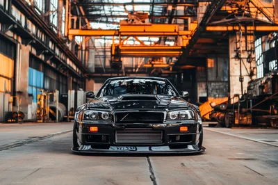 Modified Nissan Skyline GT-R R34 in Industrial Warehouse