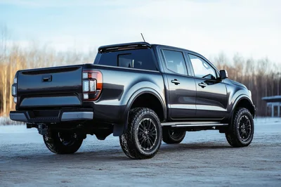 Dark Gray Pickup Truck Parked On Snowy Ground