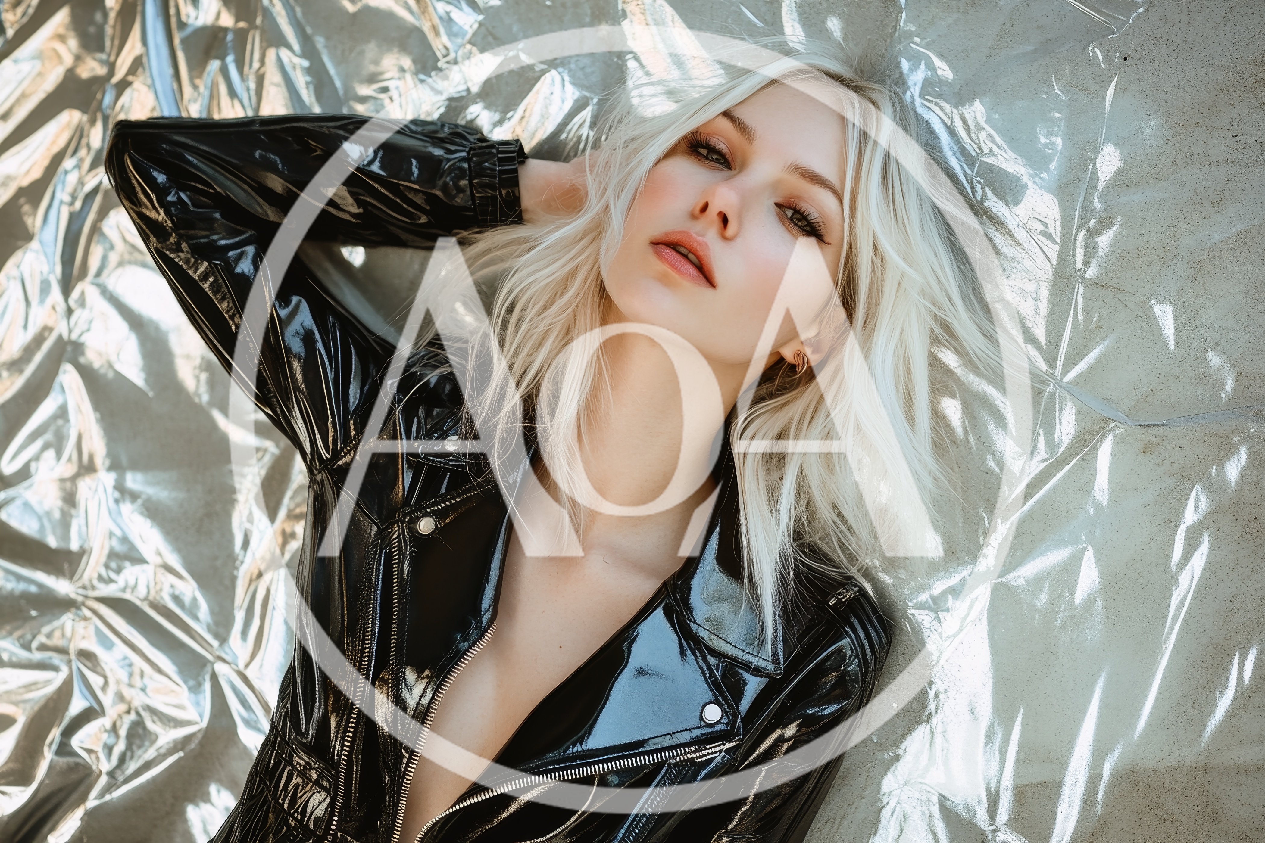 Blonde Woman In Black Vinyl Jacket Posing