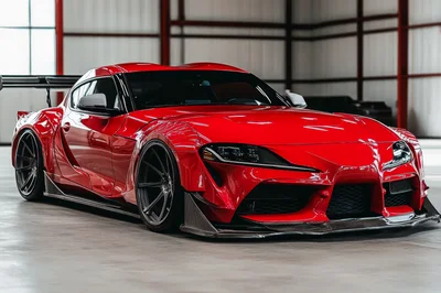 Modified Red Toyota Supra Sports Car