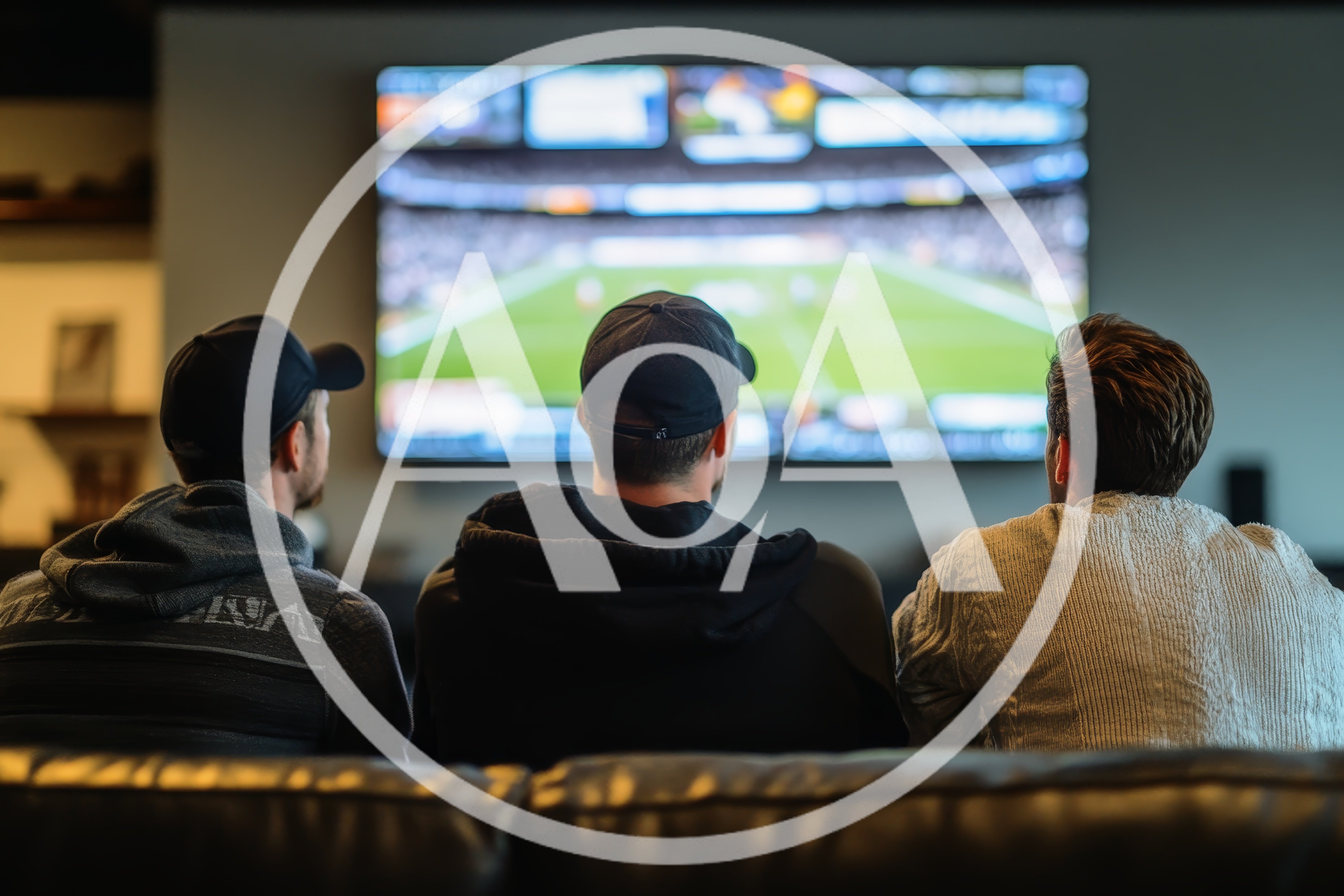 Three Men Watching A Football Game On Television