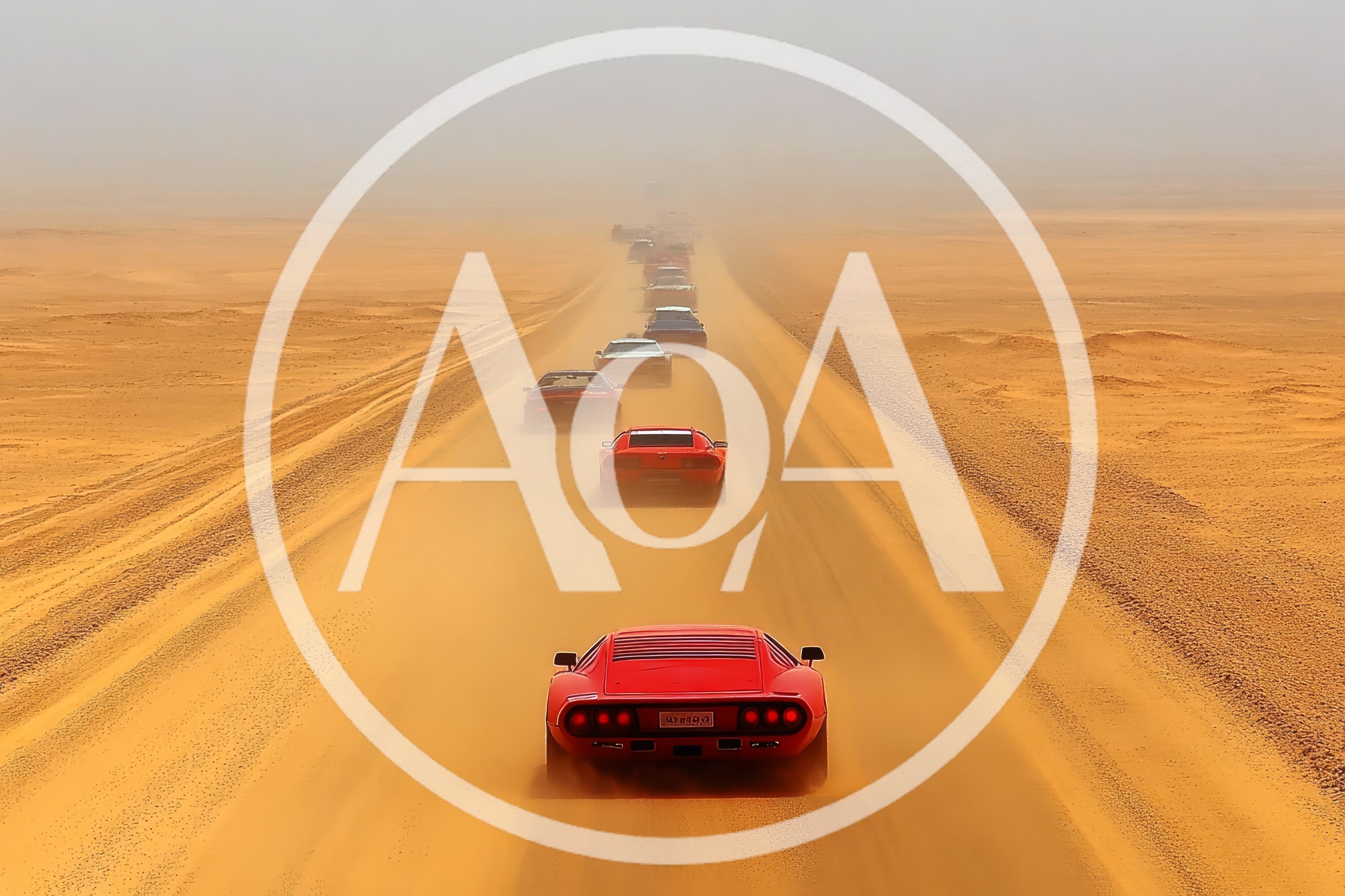 Convoy of Vintage Sports Cars Driving Through Desert