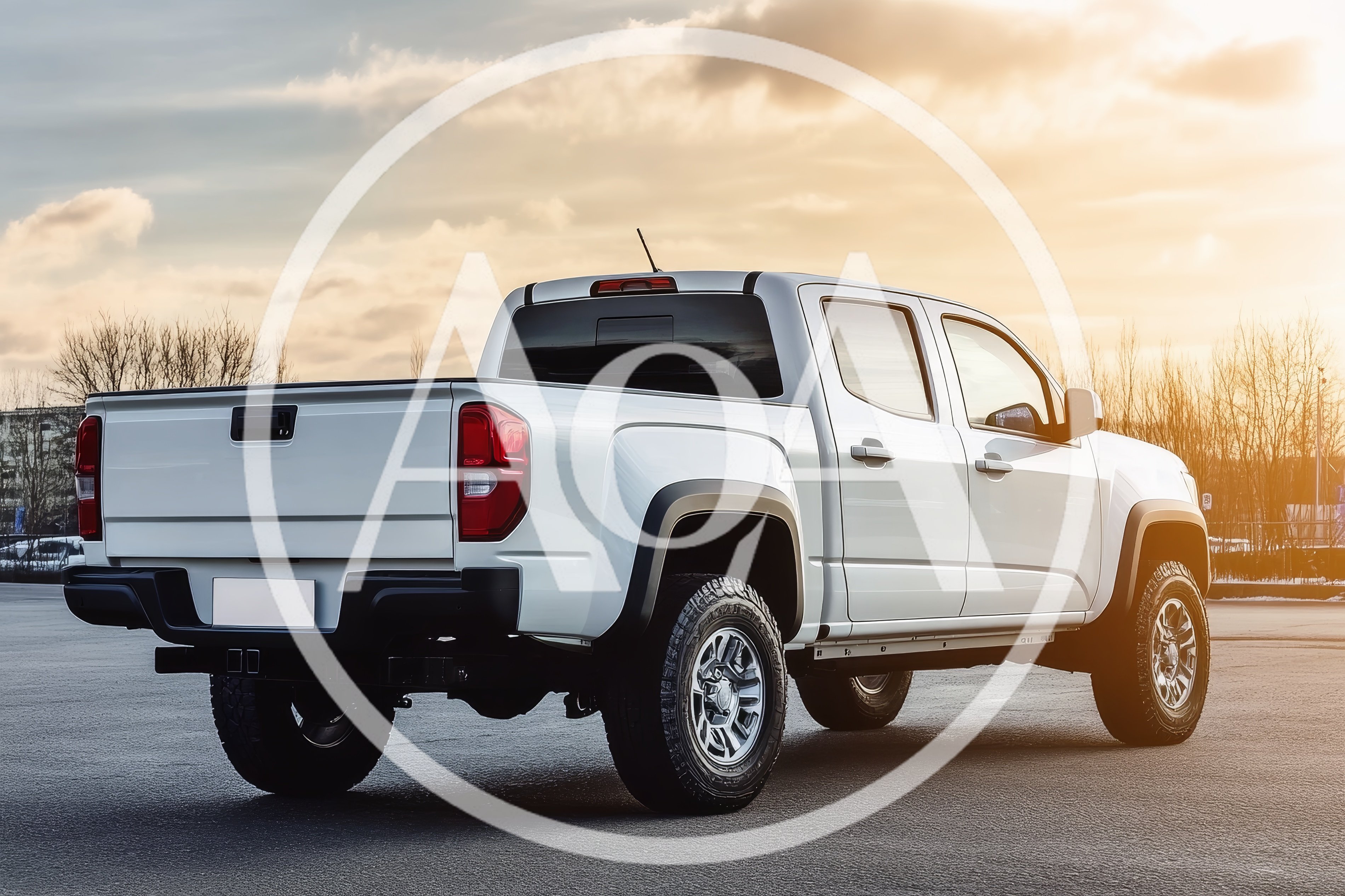 White Pickup Truck Parked Outdoors At Sunset