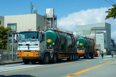 Industrial Tanker Truck Transporting Chemicals On Road