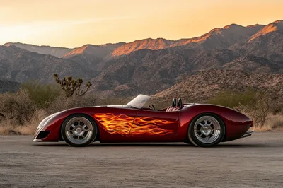 Custom Red Roadster With Flame Decals In Desert Landscape
